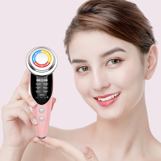Woman holding pink color 7 in 1 Skin Rejuvenation Device